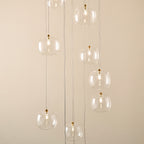 120834 Oslo 12 Light Pendant Brass