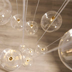 120834 Oslo 12 Light Pendant Brass