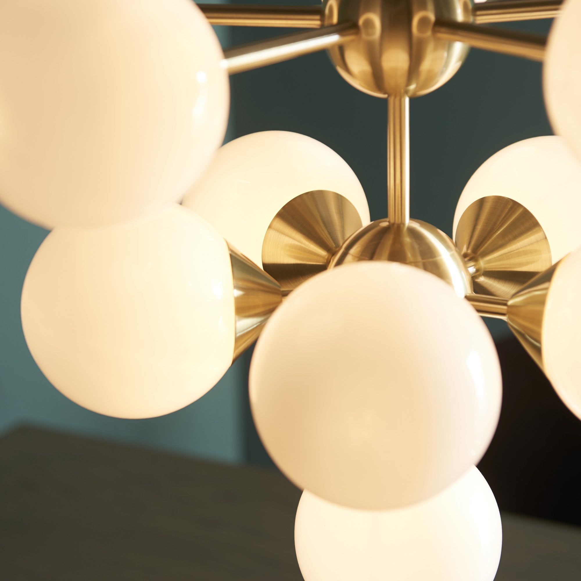 76500 Oscar 11 Light Pendant Brass White