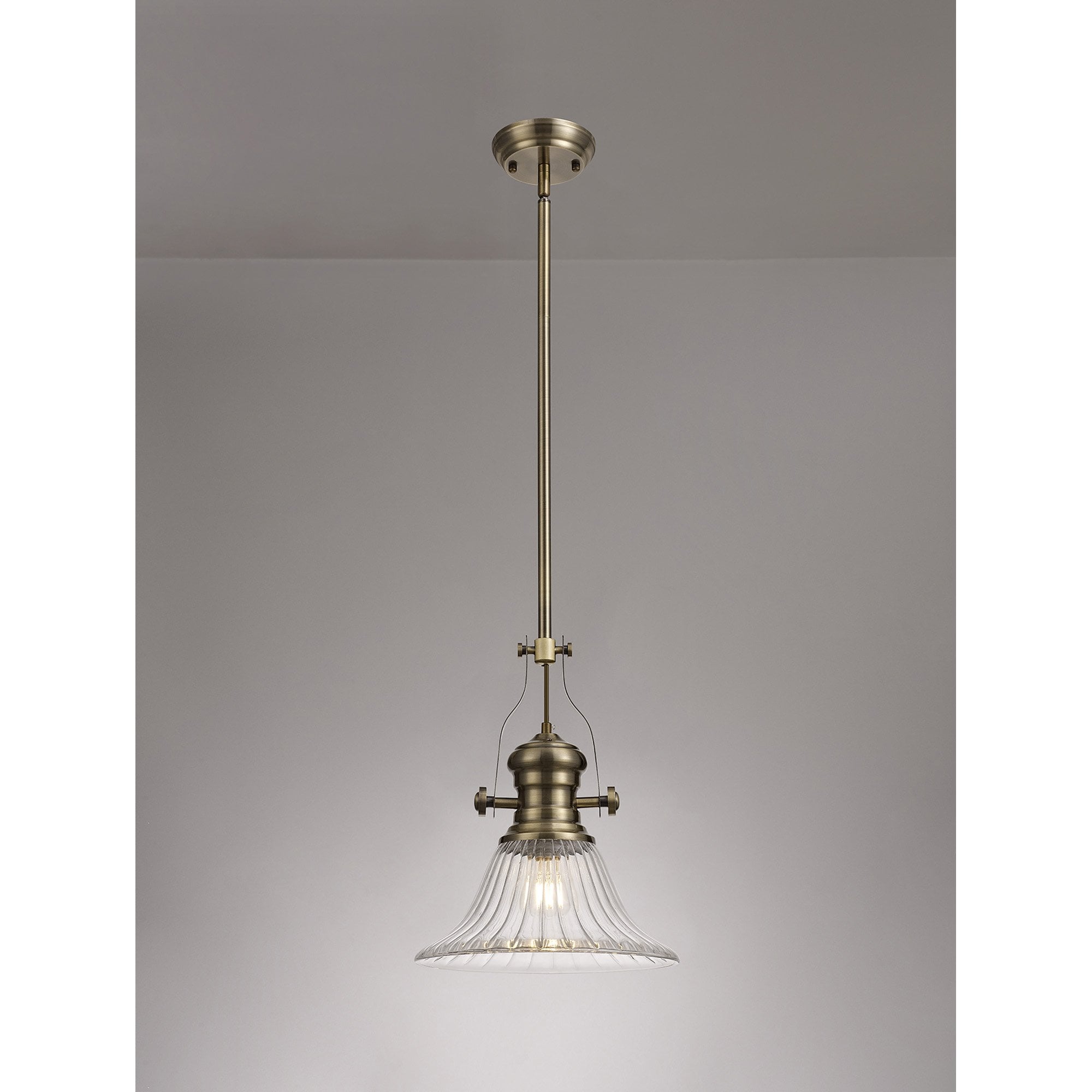 NLK01179 Louis 1 Light Telescopic Pendant With 30cm Bell Glass Shade Antique Brass/Clear