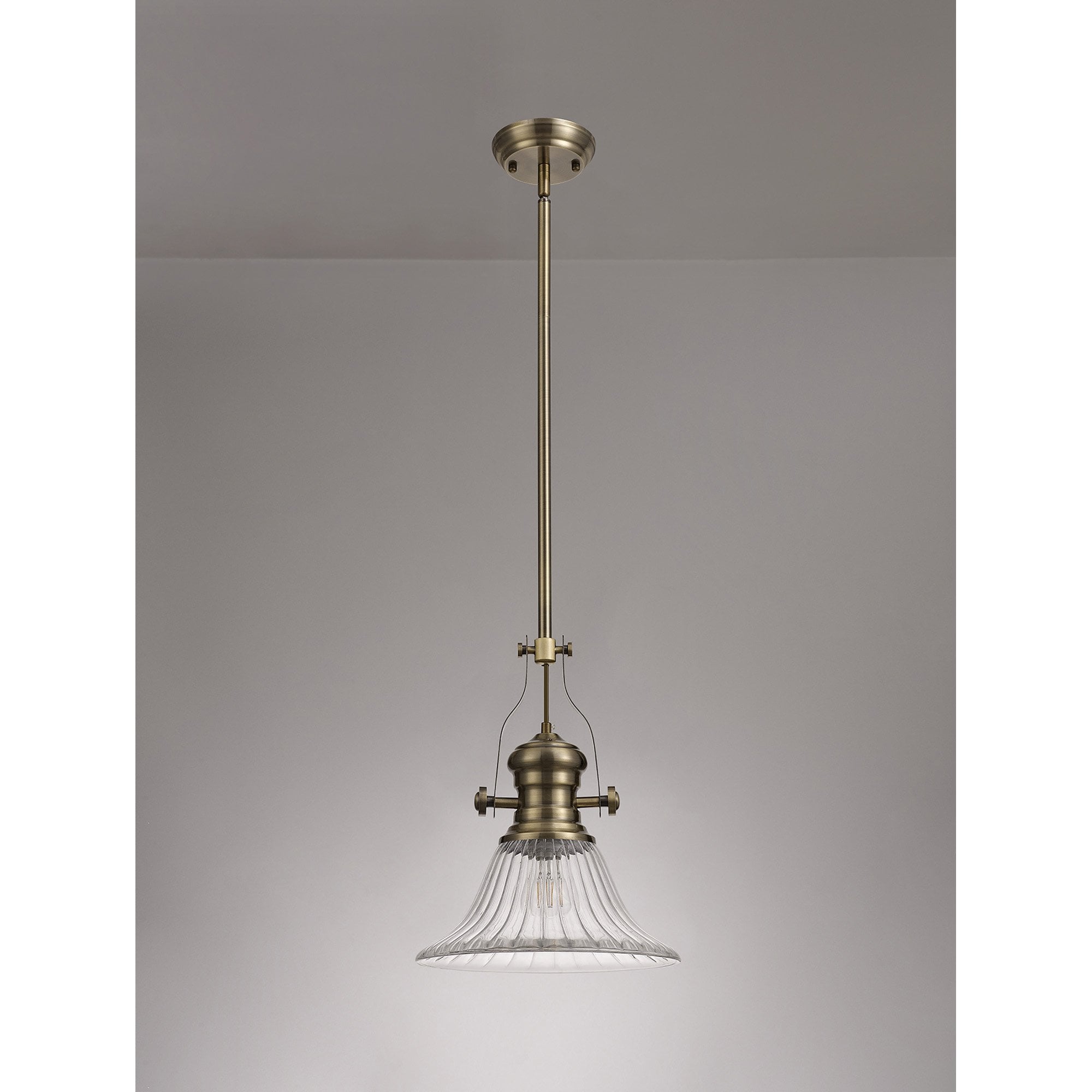 NLK01179 Louis 1 Light Telescopic Pendant With 30cm Bell Glass Shade Antique Brass/Clear