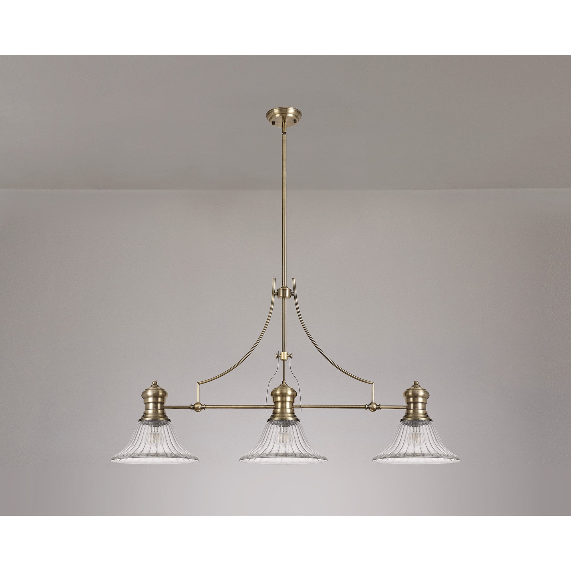 NLK03559 Louis 3 Light Telescopic Pendant With 30cm Bell Glass Shade Antique Brass/Clear