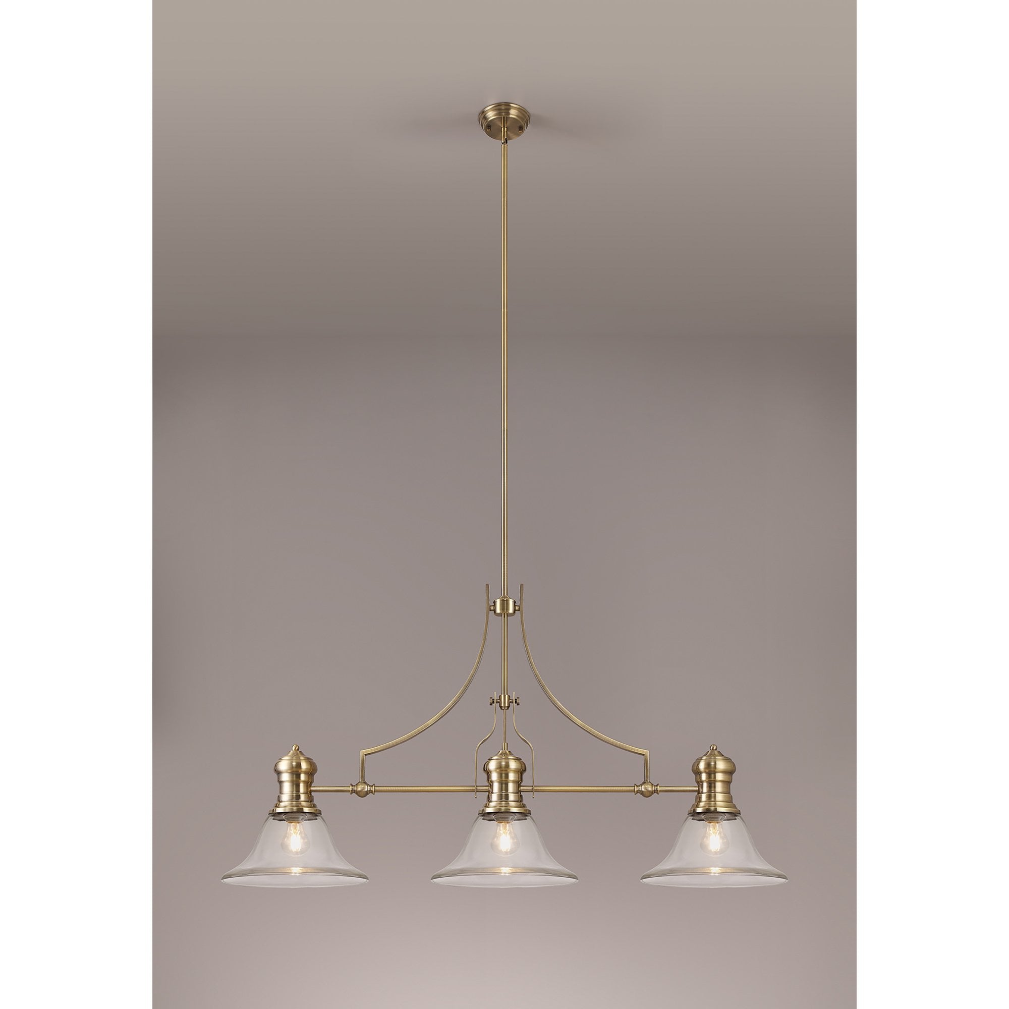 NLK03609 Louis 3 Light Telescopic Pendant With 30cm Smooth Bell Glass Shade Antique Brass/Clear