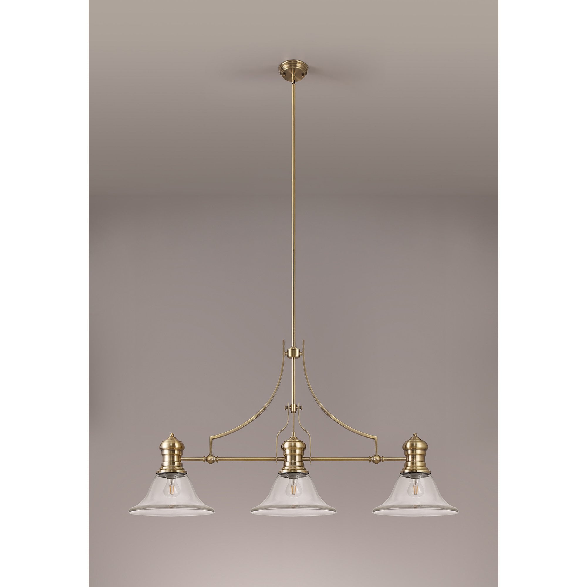 NLK03609 Louis 3 Light Telescopic Pendant With 30cm Smooth Bell Glass Shade Antique Brass/Clear