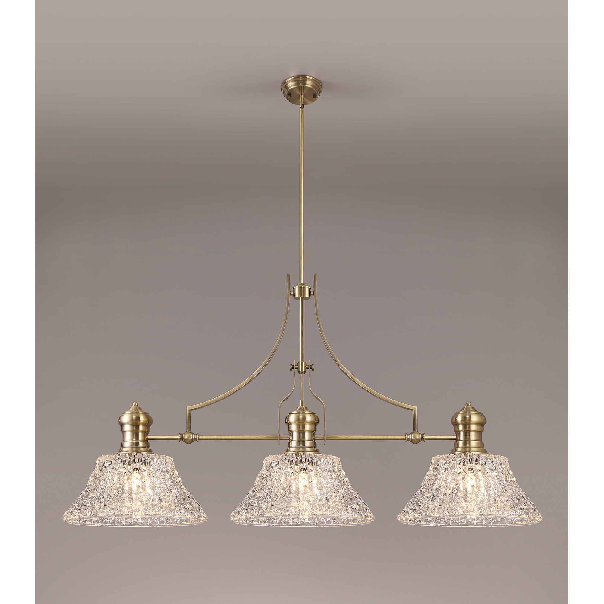 NLK04749 Louis Linear Pendant With 38cm Patterned Round Shade Antique Brass/Clear Glass