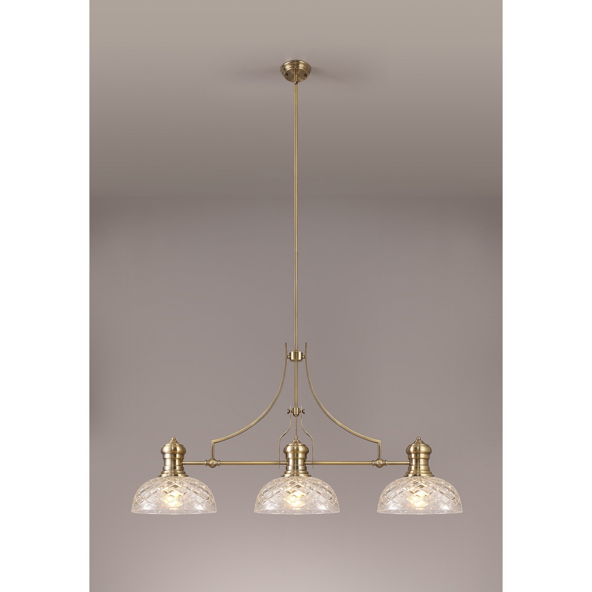 NLK04809 Louis Linear Pendant With 30cm Flat Round Patterned Shade Antique Brass/Clear Glass