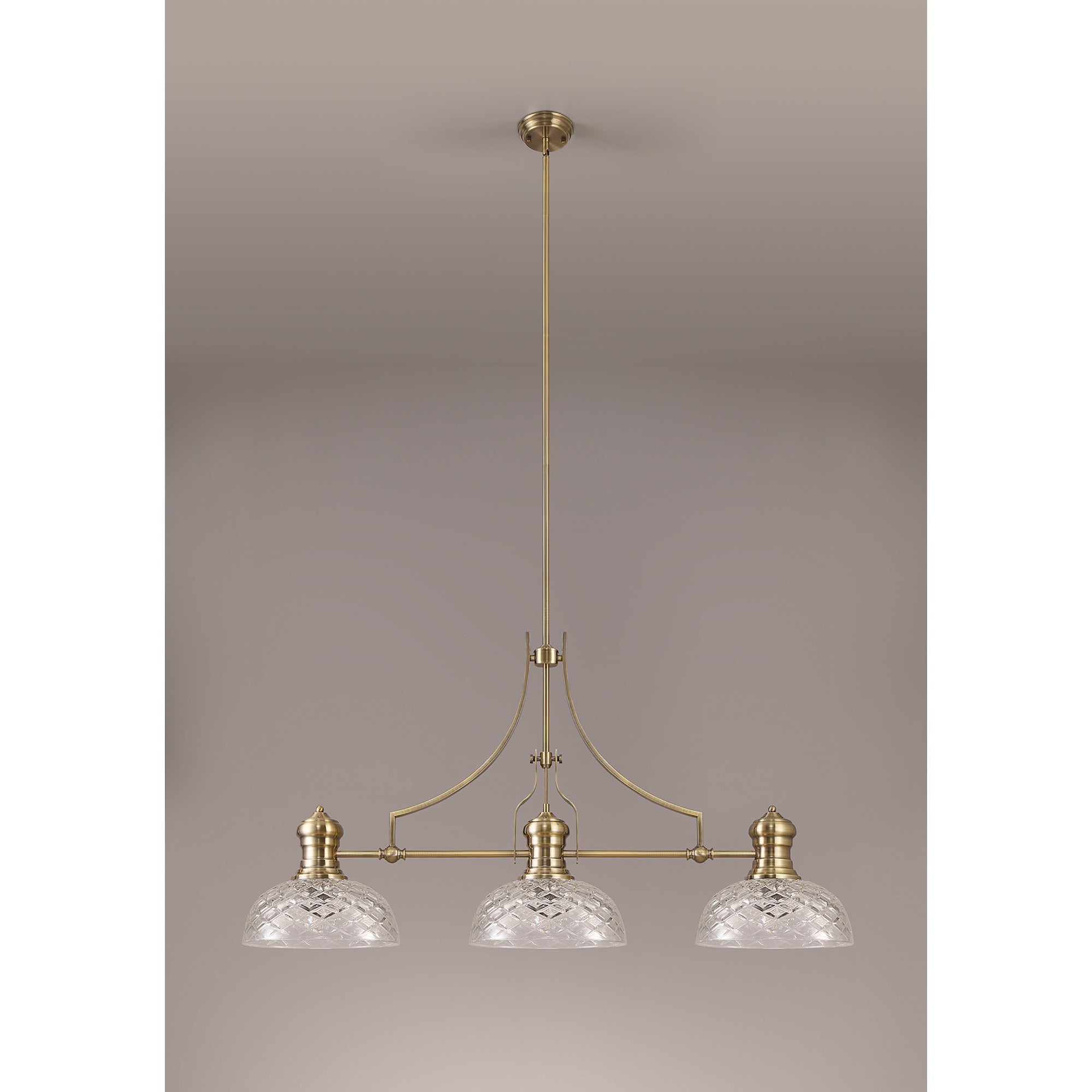 NLK04809 Louis Linear Pendant With 30cm Flat Round Patterned Shade Antique Brass/Clear Glass