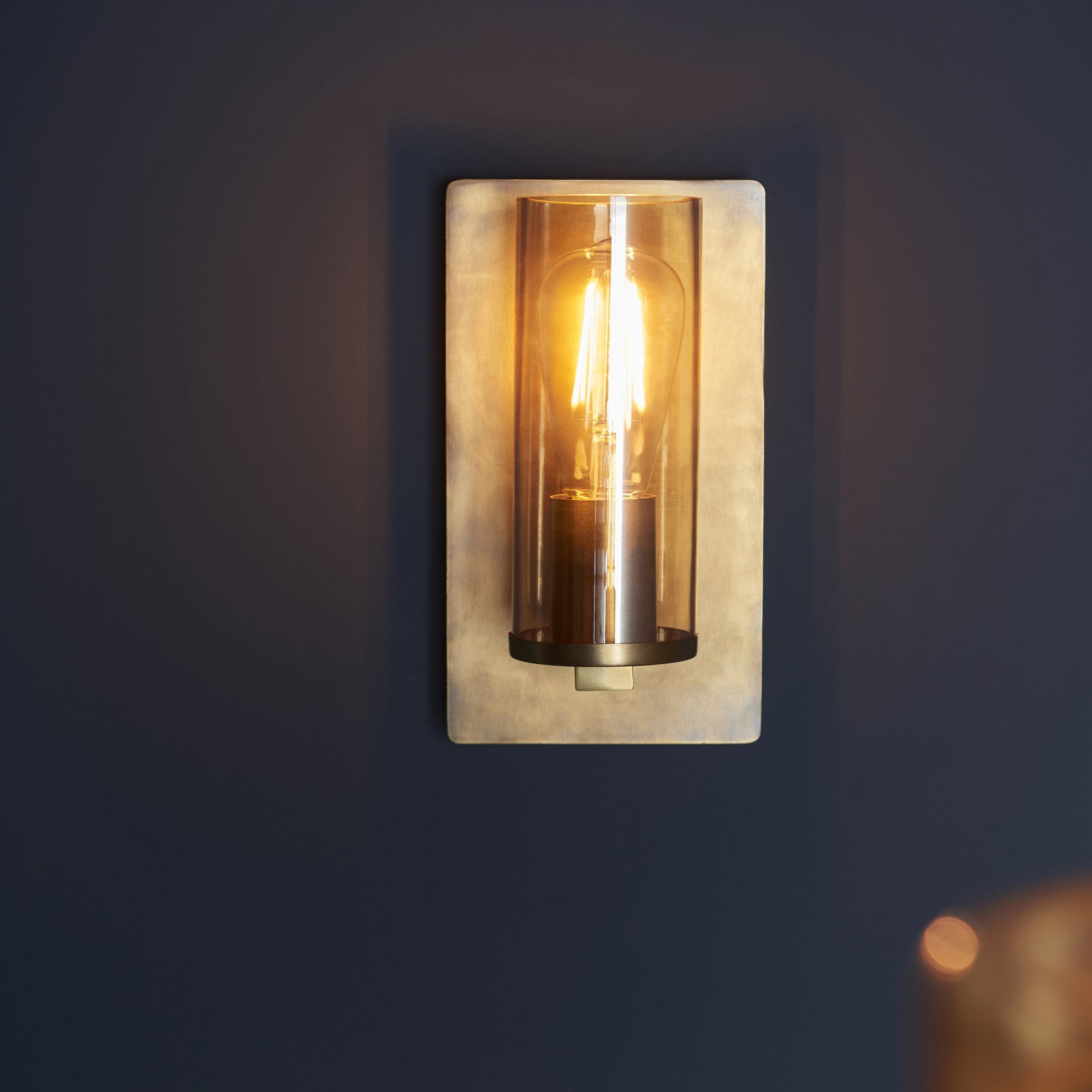 90598 1 Light Wall Light Brass Patina & Champagne Lustre Glass