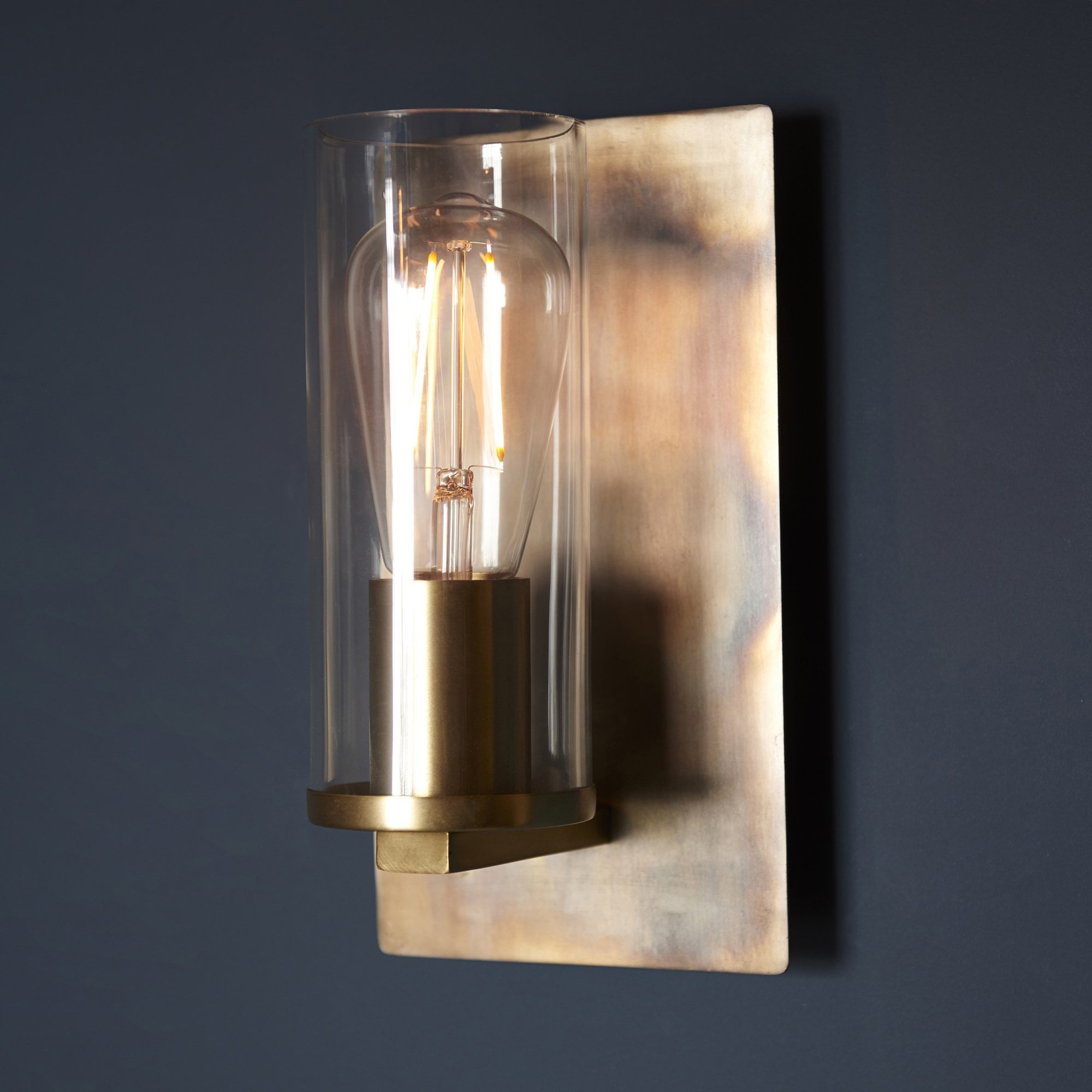 90600 1 Light Wall Light Bronze Patina Plate & Clear Glass