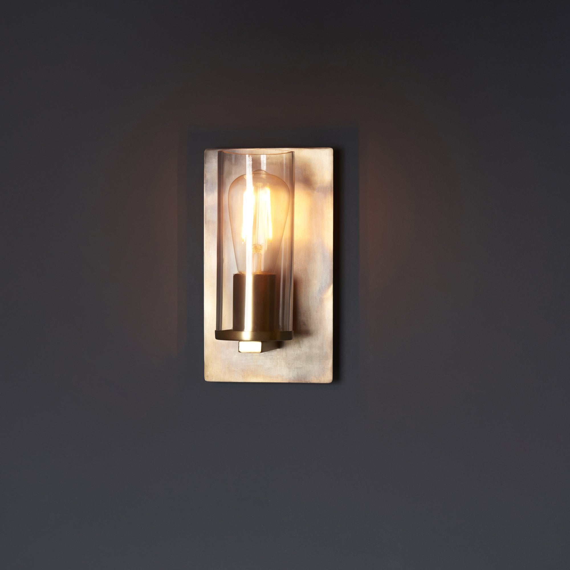 90600 1 Light Wall Light Bronze Patina Plate & Clear Glass