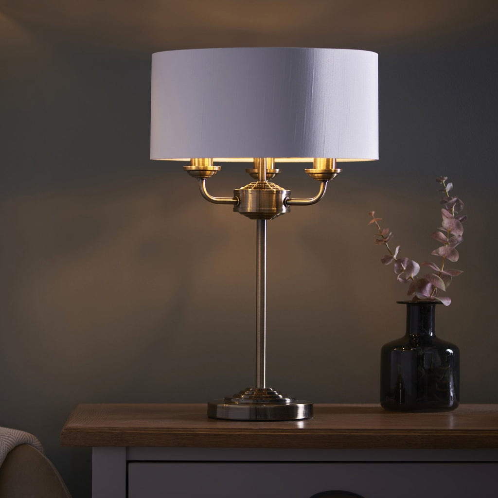 98932 Highclere 3 Light Table Lamp Antique Brass Plate & Vintage White Fabric