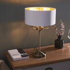 98932 Highclere 3 Light Table Lamp Antique Brass Plate & Vintage White Fabric