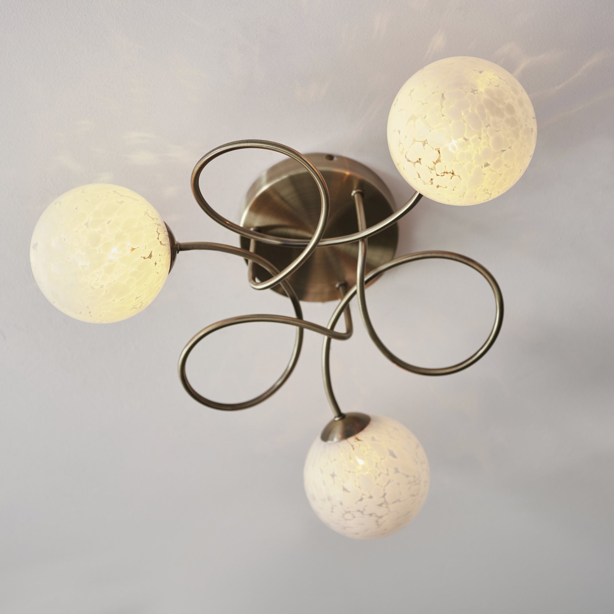 97647 Delos 3 Light Semi Flush Antique Brass Plate And White Confetti Glass