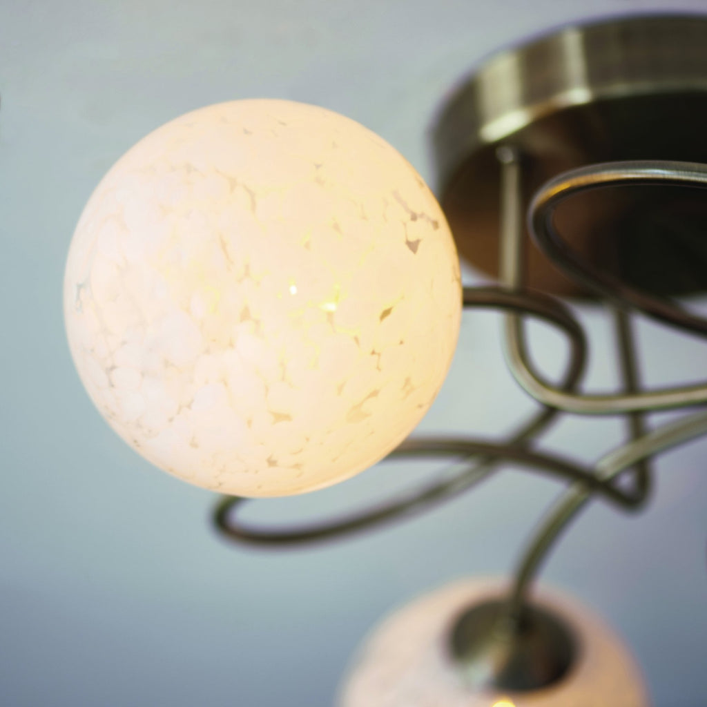 97647 Delos 3 Light Semi Flush Antique Brass Plate And White Confetti Glass