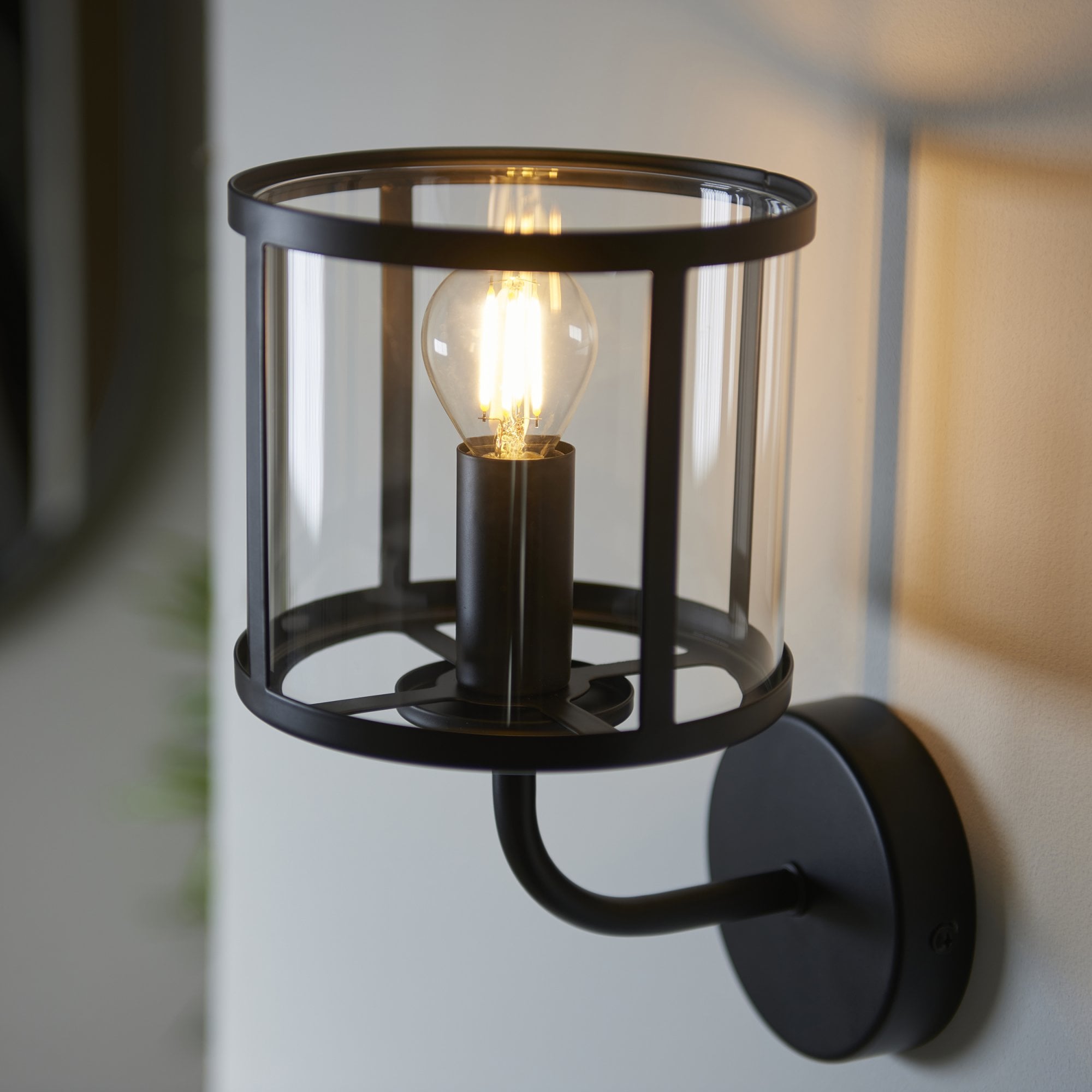 104193 Hopton 1 Light Wall Matt Black And Clear Glass