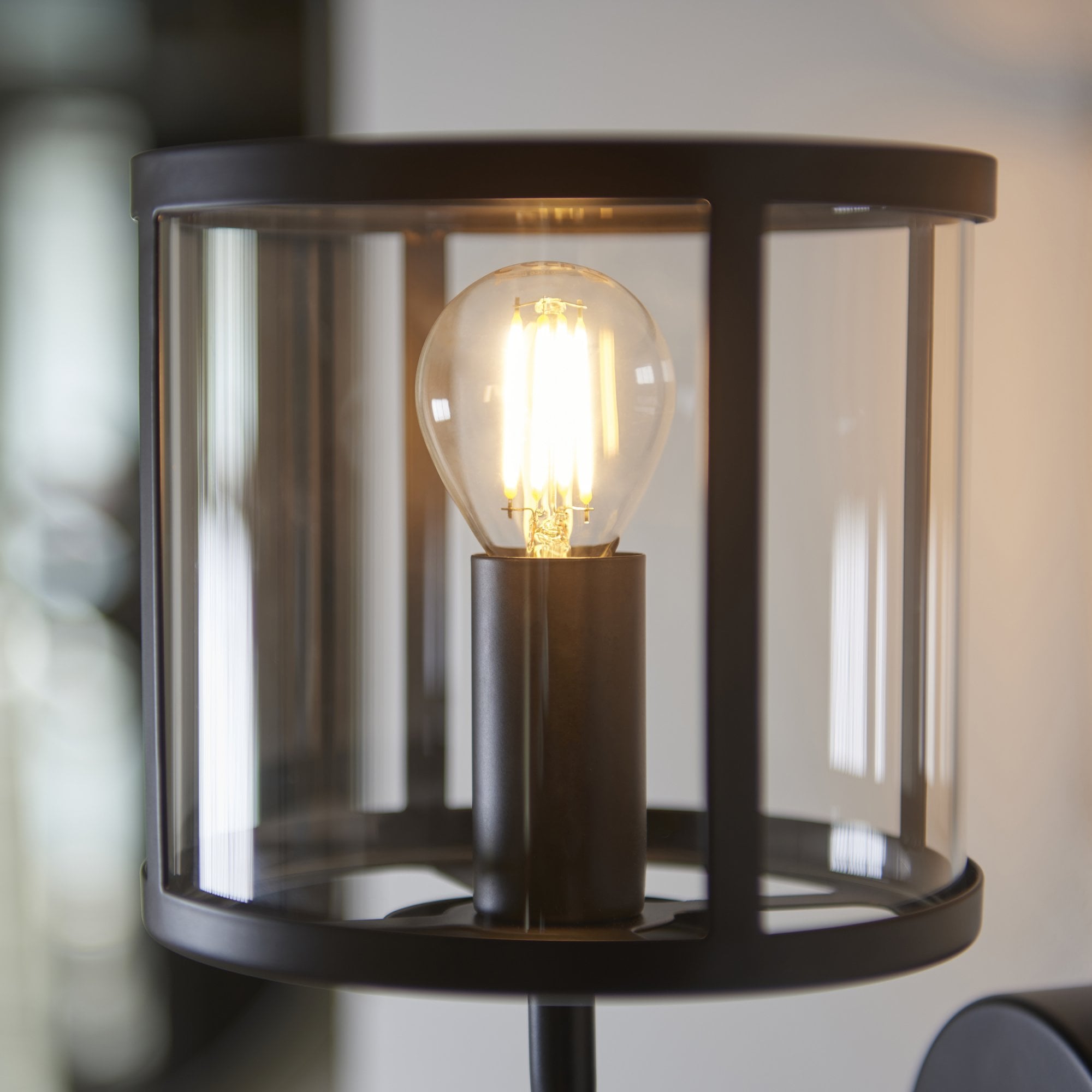 104193 Hopton 1 Light Wall Matt Black And Clear Glass