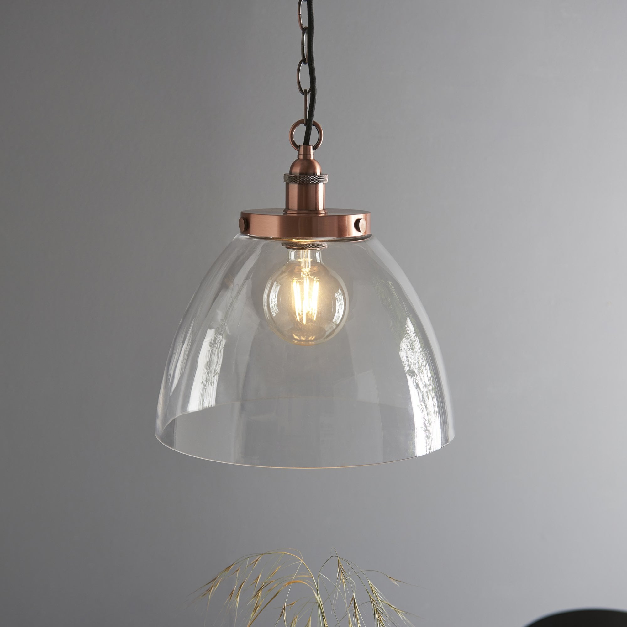 106895 Hansen Grand 1 Light Pendant Aged Copper Plate And Clear Glass
