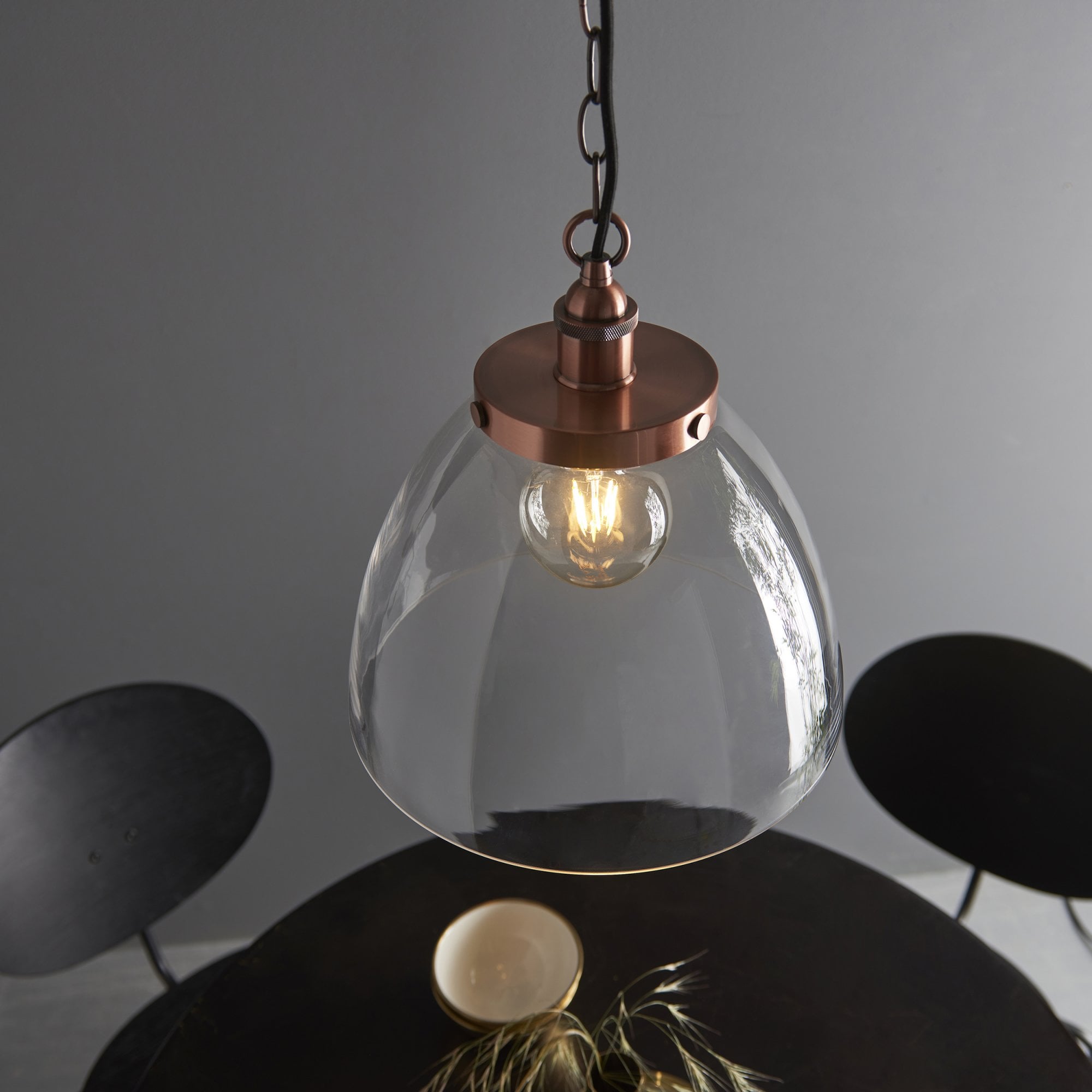 106895 Hansen Grand 1 Light Pendant Aged Copper Plate And Clear Glass