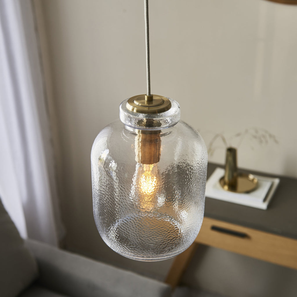 106923 Lyra 1 Light Pendant Clear Textured Glass And Antique Brass Plate
