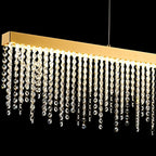 IL32877 Bano Linear Dimmable Pendant 40W LED French Gold / Crystal Chain