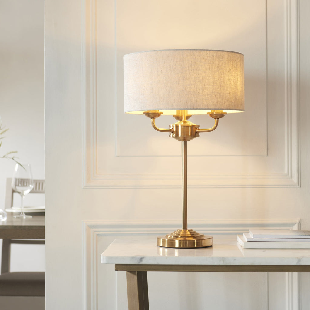 110721 Highclere 3 Light Table Lamp Vintage Brass & Natural Linen Shade