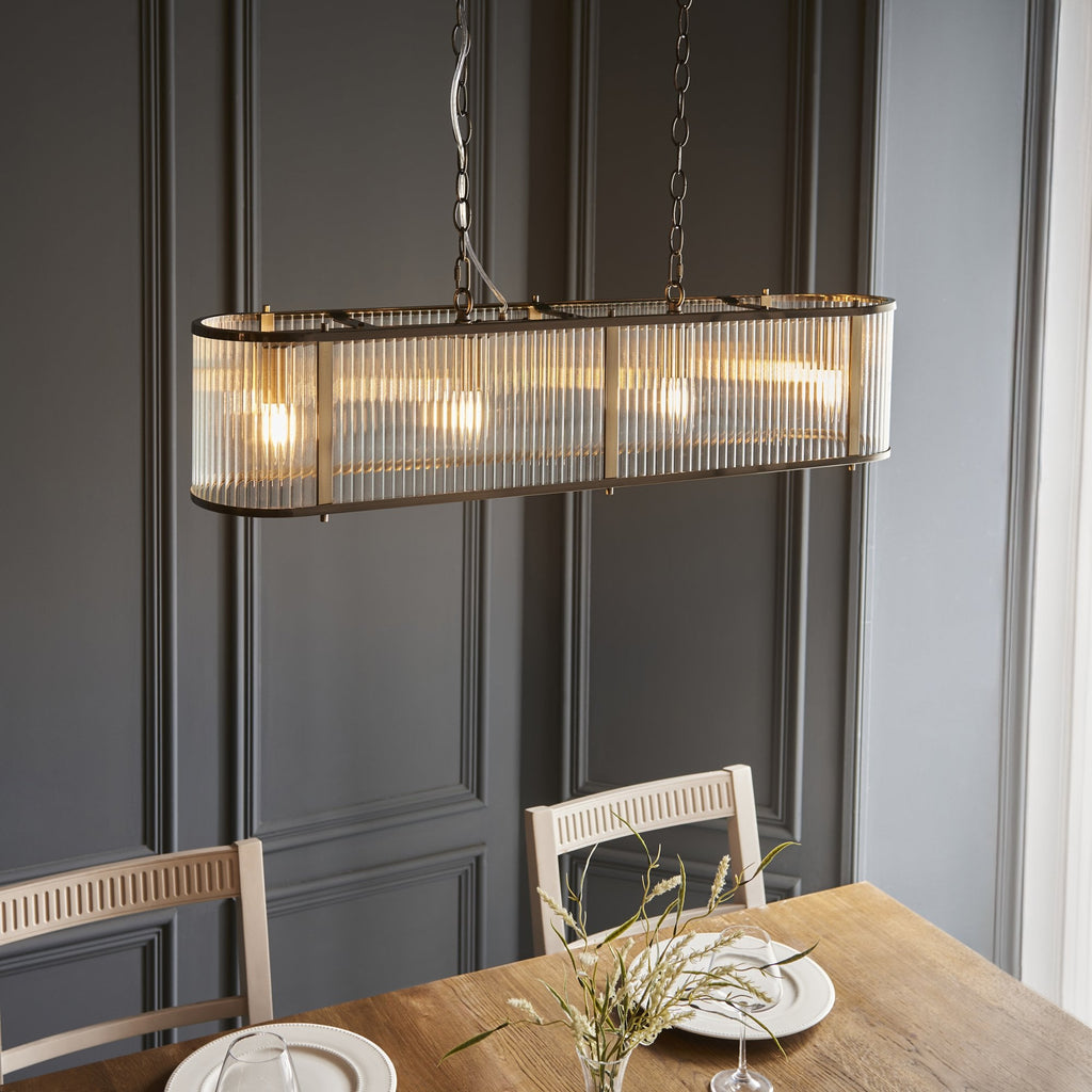110945 Ridgeton 4 LightLinear Pendant Antique Brass & Clear Glass