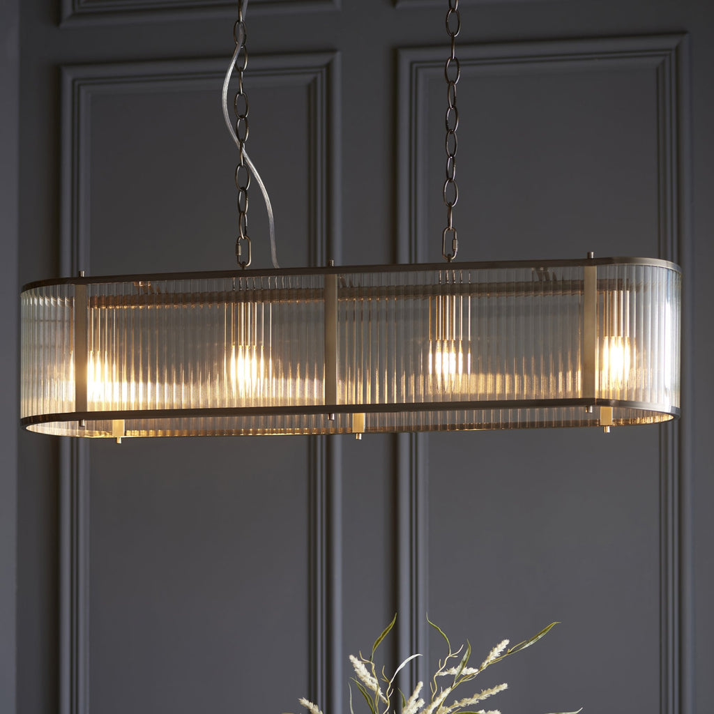 110945 Ridgeton 4 LightLinear Pendant Antique Brass & Clear Glass