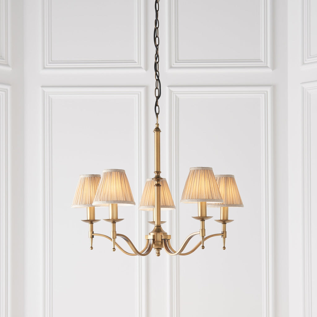 63627 Stanford Antique Brass 5 Light Pendant Beige Shades
