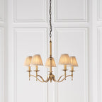 63627 Stanford Antique Brass 5 Light Pendant Beige Shades