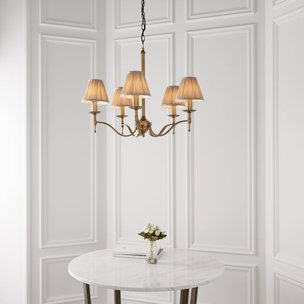 63627 Stanford Antique Brass 5 Light Pendant Beige Shades