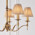 63627 Stanford Antique Brass 5 Light Pendant Beige Shades