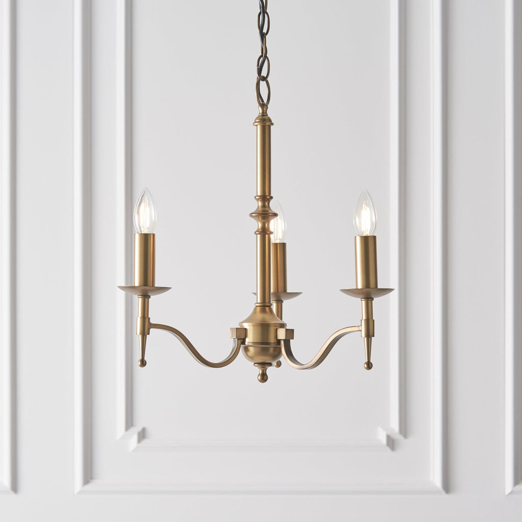 63628 Stanford Antique Brass 3 Light Pendant Beige Shades