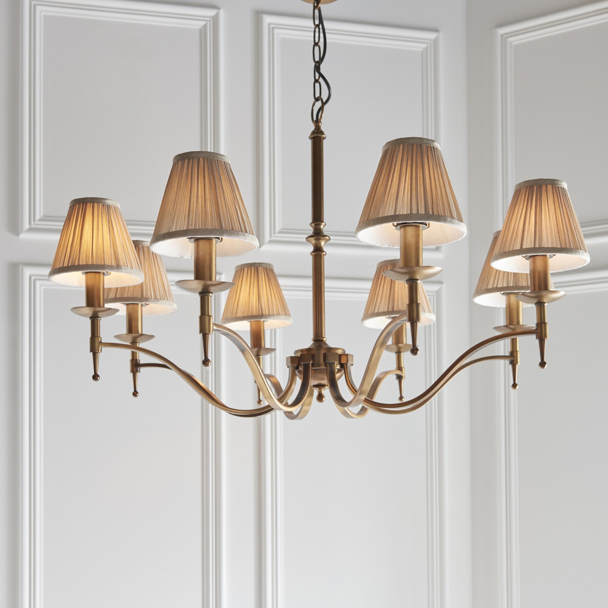 63629 Stanford Antique Brass 8 Light Pendant Beige Shades