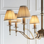 63629 Stanford Antique Brass 8 Light Pendant Beige Shades