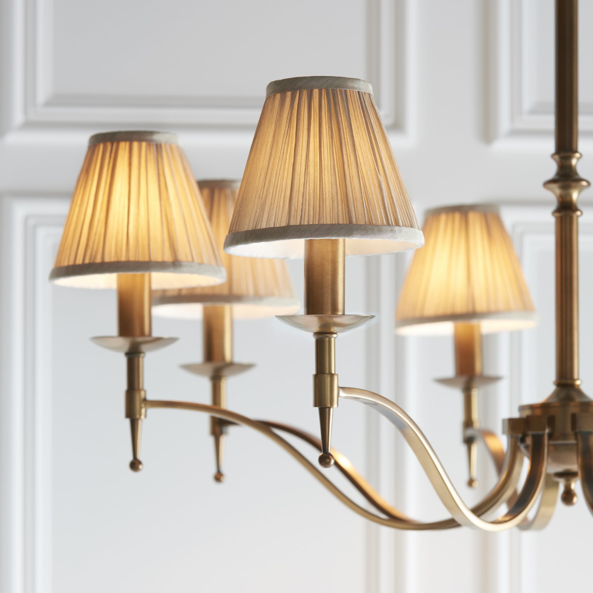 63629 Stanford Antique Brass 8 Light Pendant Beige Shades