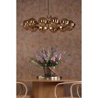 OPH1235 Ophira 12 Light Pendant Antique Gold and Amber Ribbed Glass