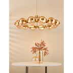 OPH1235 Ophira 12 Light Pendant Antique Gold and Amber Ribbed Glass