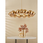 OPH1235 Ophira 12 Light Pendant Antique Gold and Amber Ribbed Glass