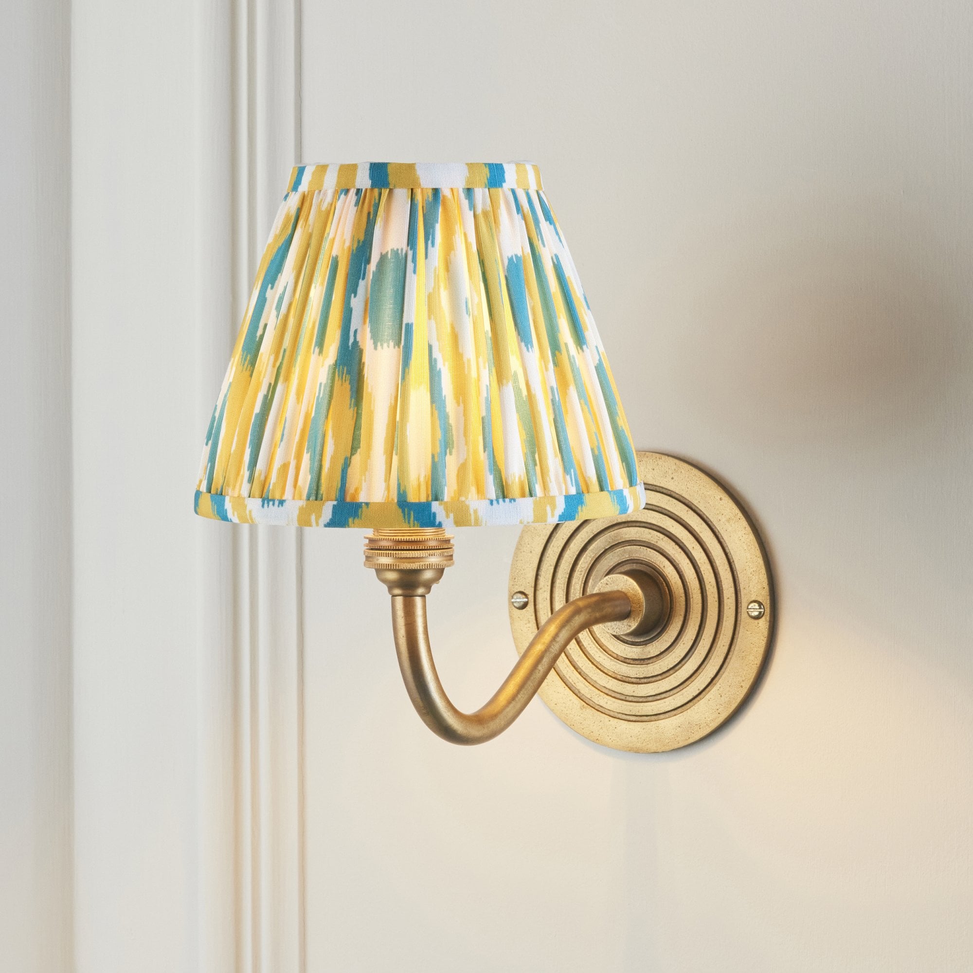 114099 Ripple Curve & Ikat 16cm Wall Light Antique Brass With Yellow & Jade Fabric