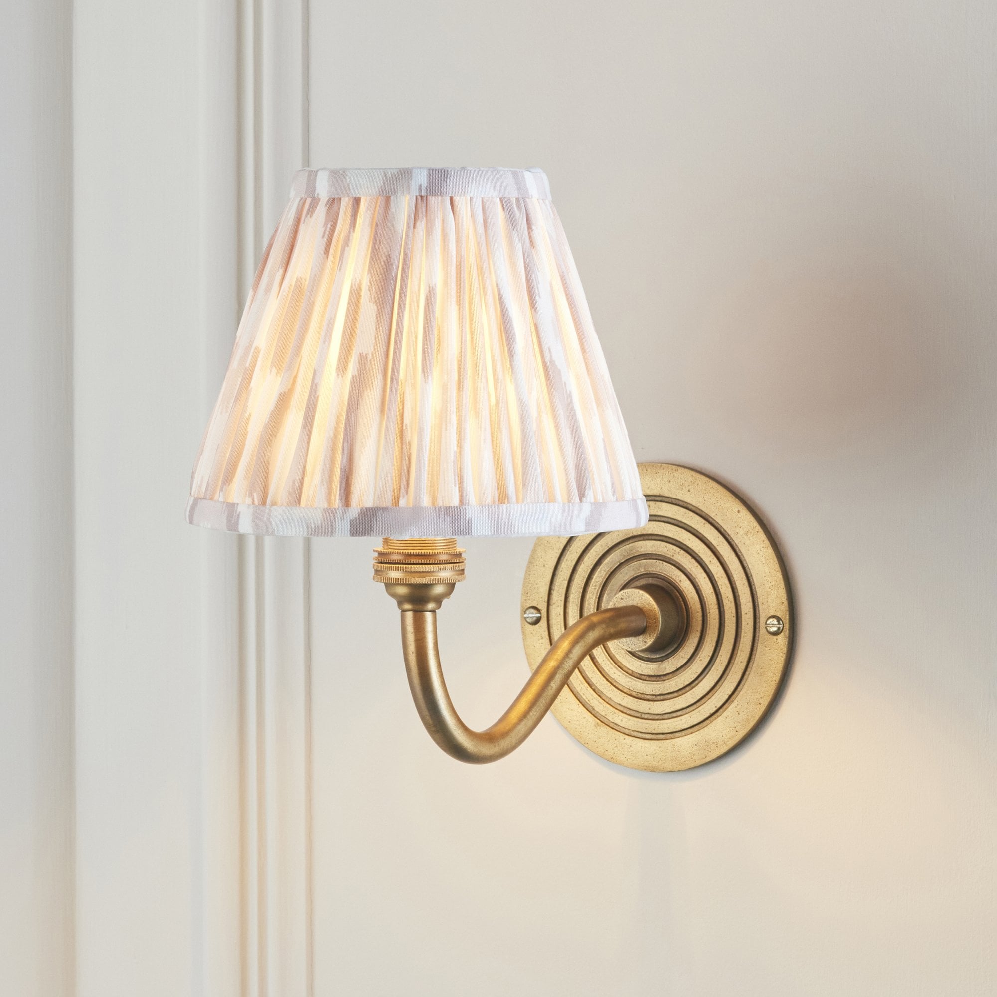 114102 Ripple Curve & Ikat 16cm Wall Light Antique Brass & Neutral Print Fabric