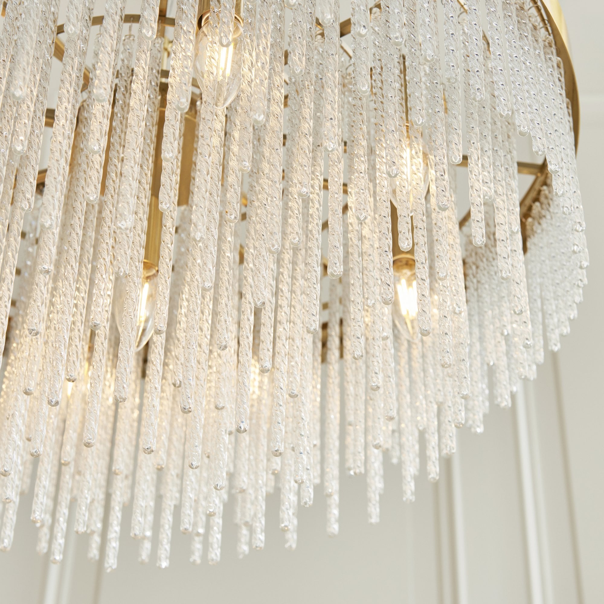 115347 Anistoria Grand 9 Light Pendant Brushed Aged Brass Plate & Clear Glass