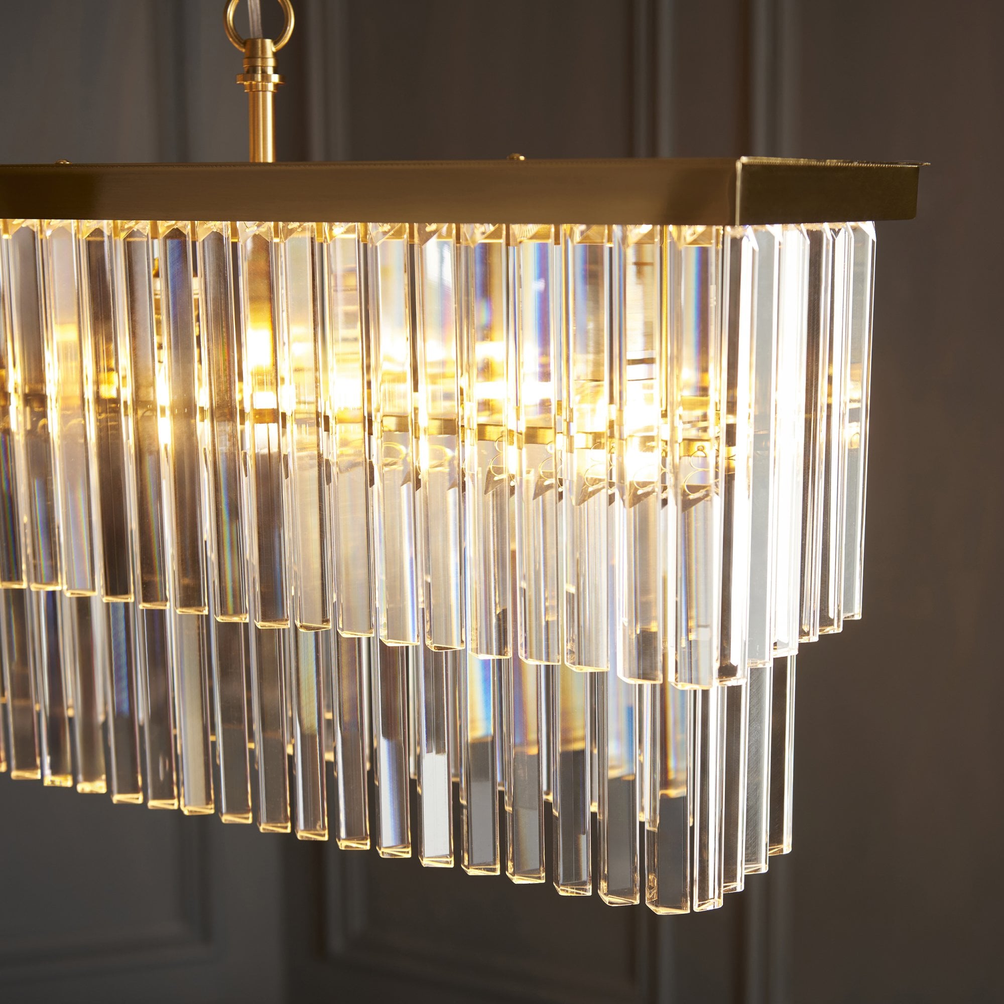 115950 Conaston 4 Light Linear Pendant Brushed Aged Brass Plate & Clear Cut Glass