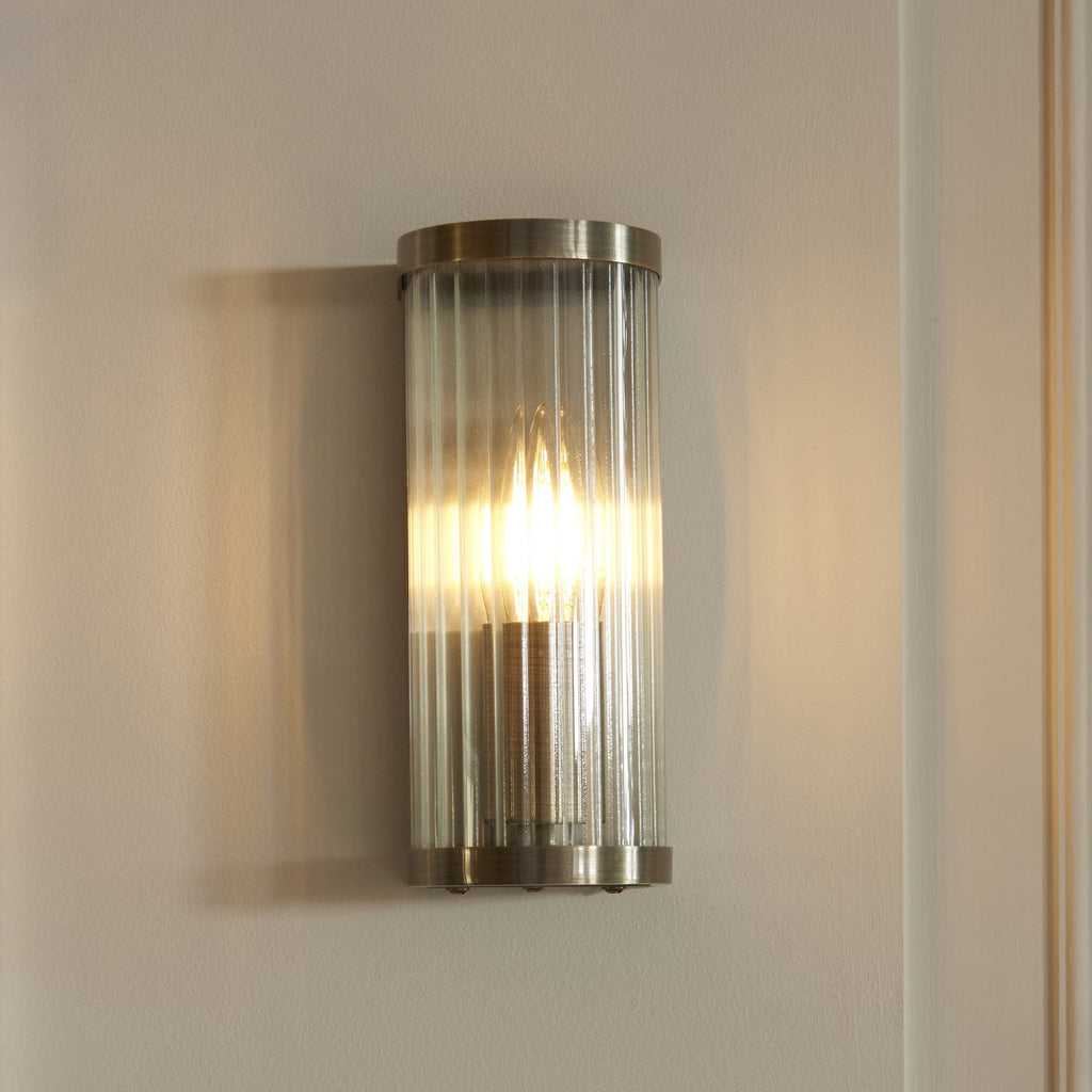 118596 Ridgeton Wall Light Antique Brass Plate & Clear Ribbed Glass