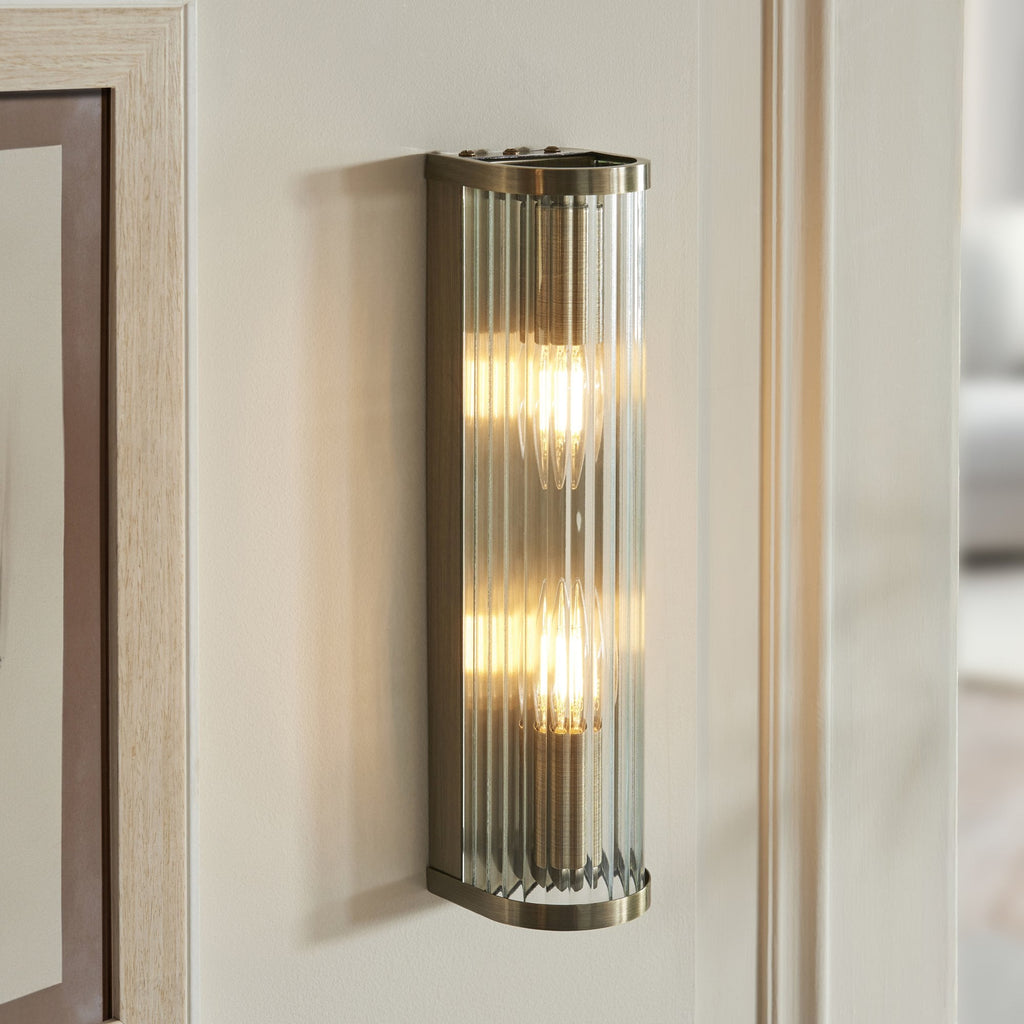 118597 Ridgeton 2 Light Wall Light Antique Brass Plate & Clear Ribbed Glass