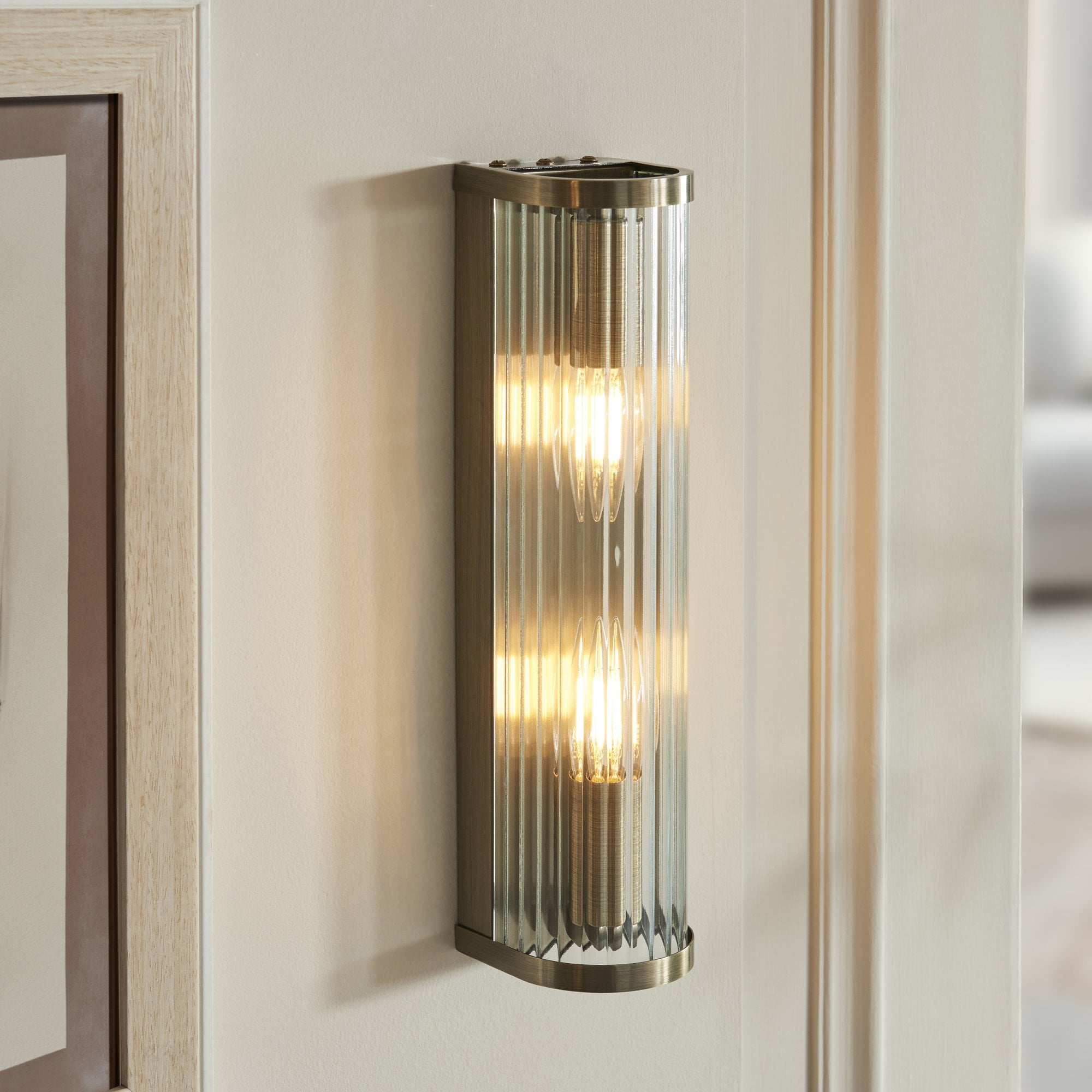 118597 Ridgeton 2 Light Wall Light Antique Brass Plate & Clear Ribbed Glass