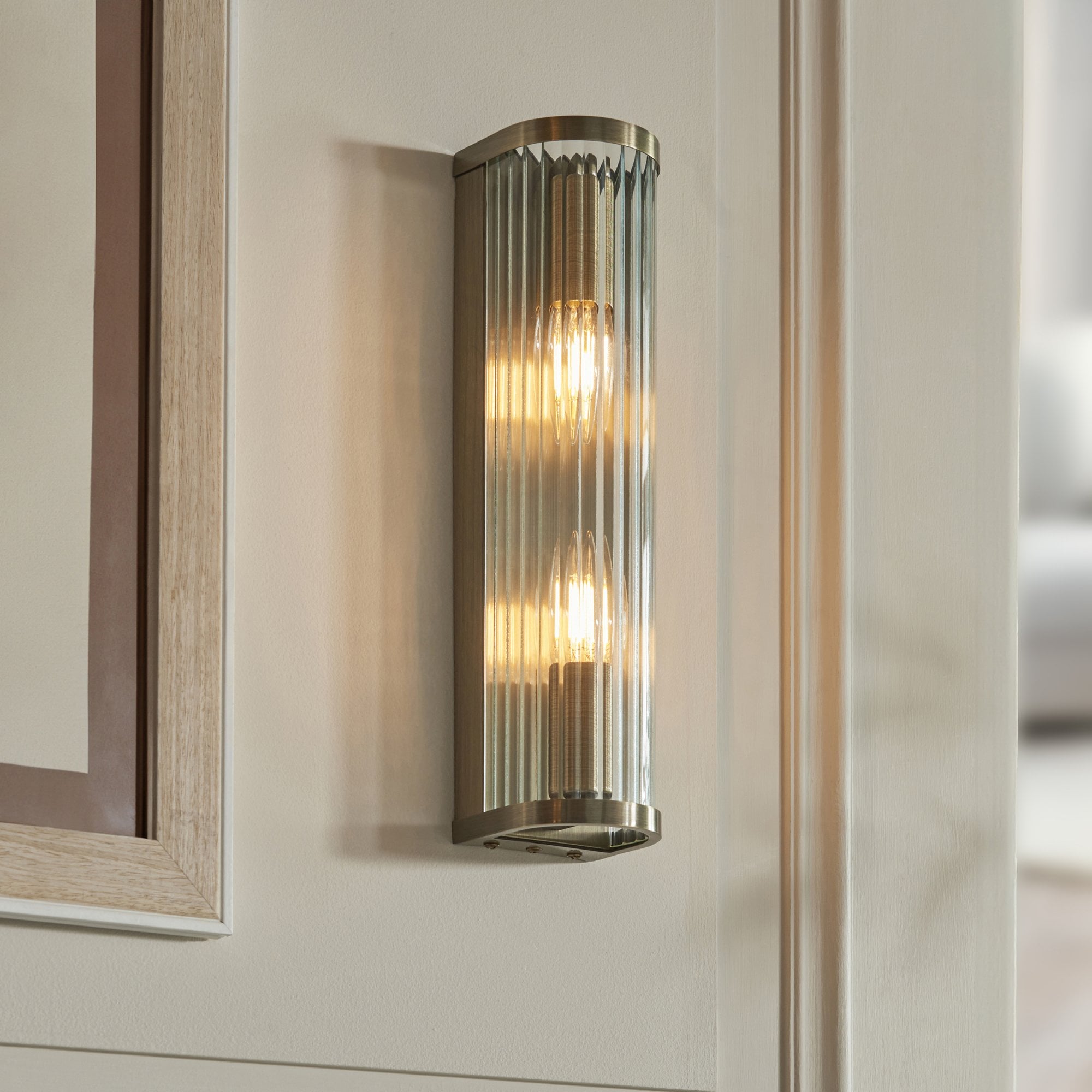 118597 Ridgeton 2 Light Wall Light Antique Brass Plate & Clear Ribbed Glass