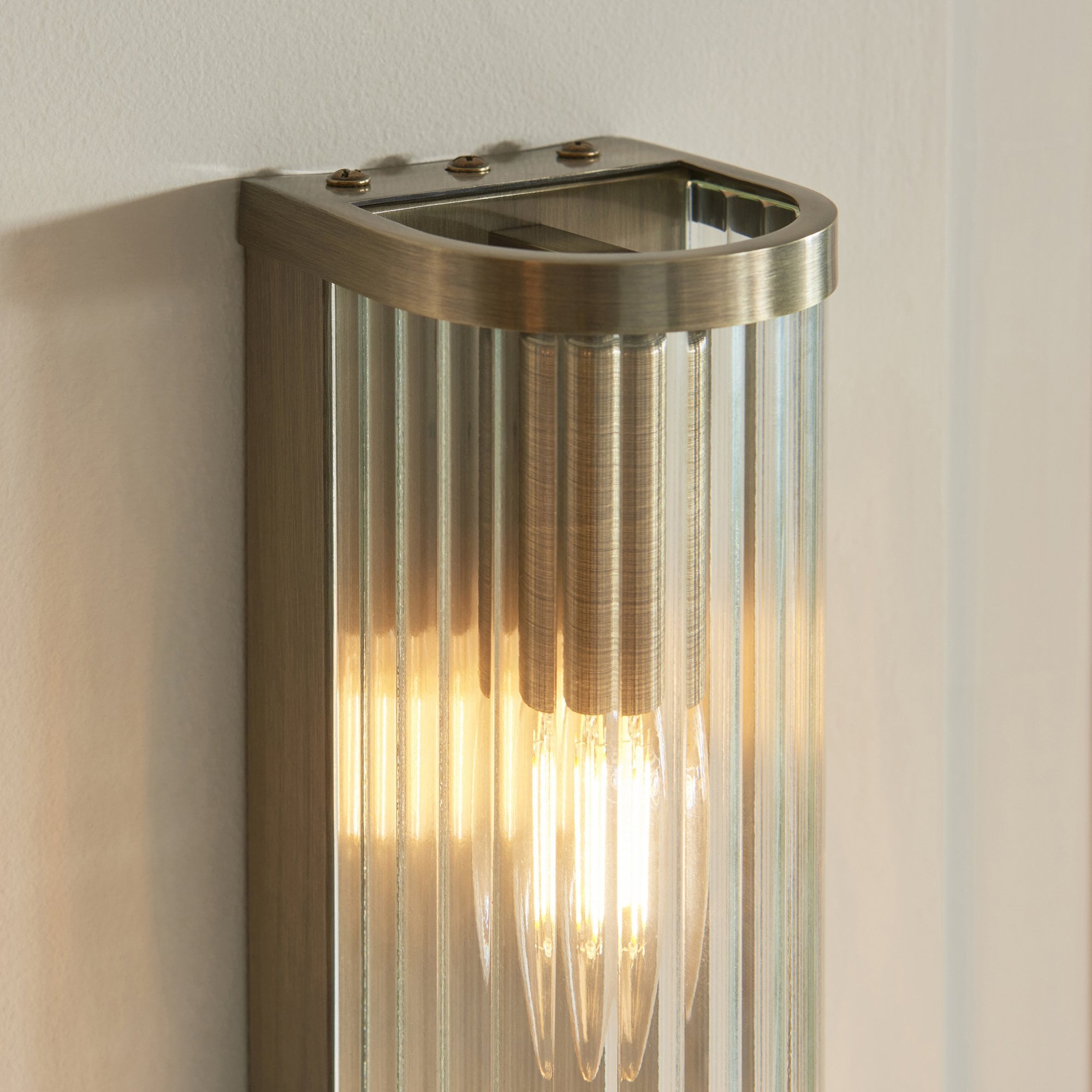 118597 Ridgeton 2 Light Wall Light Antique Brass Plate & Clear Ribbed Glass
