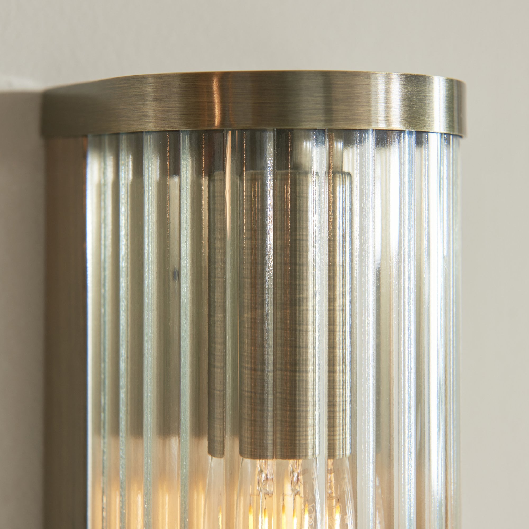 118597 Ridgeton 2 Light Wall Light Antique Brass Plate & Clear Ribbed Glass