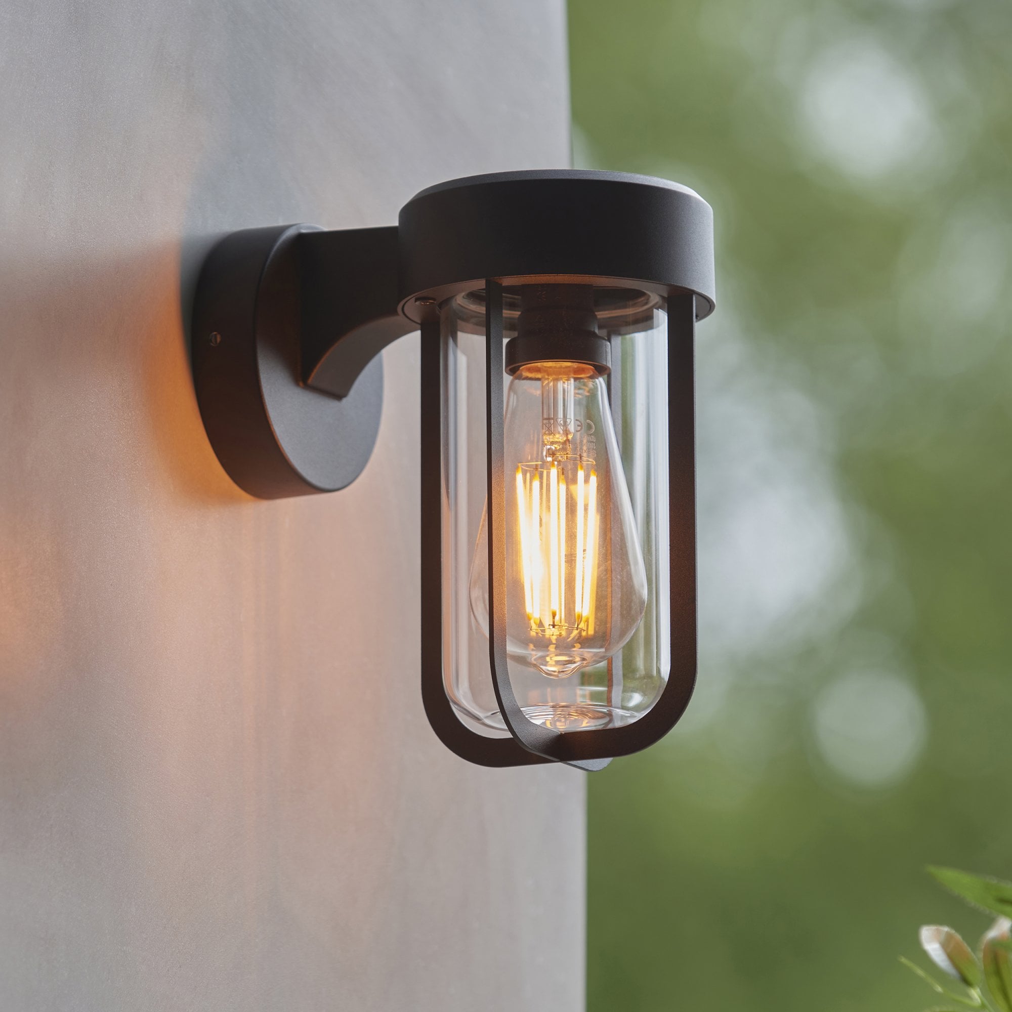 118758 Lucca Outdoor Wall Light Textured Black & Clear Glass