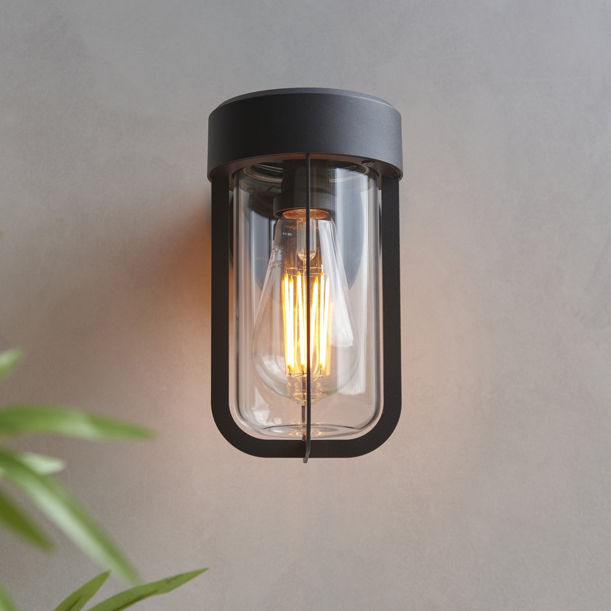 118758 Lucca Outdoor Wall Light Textured Black & Clear Glass